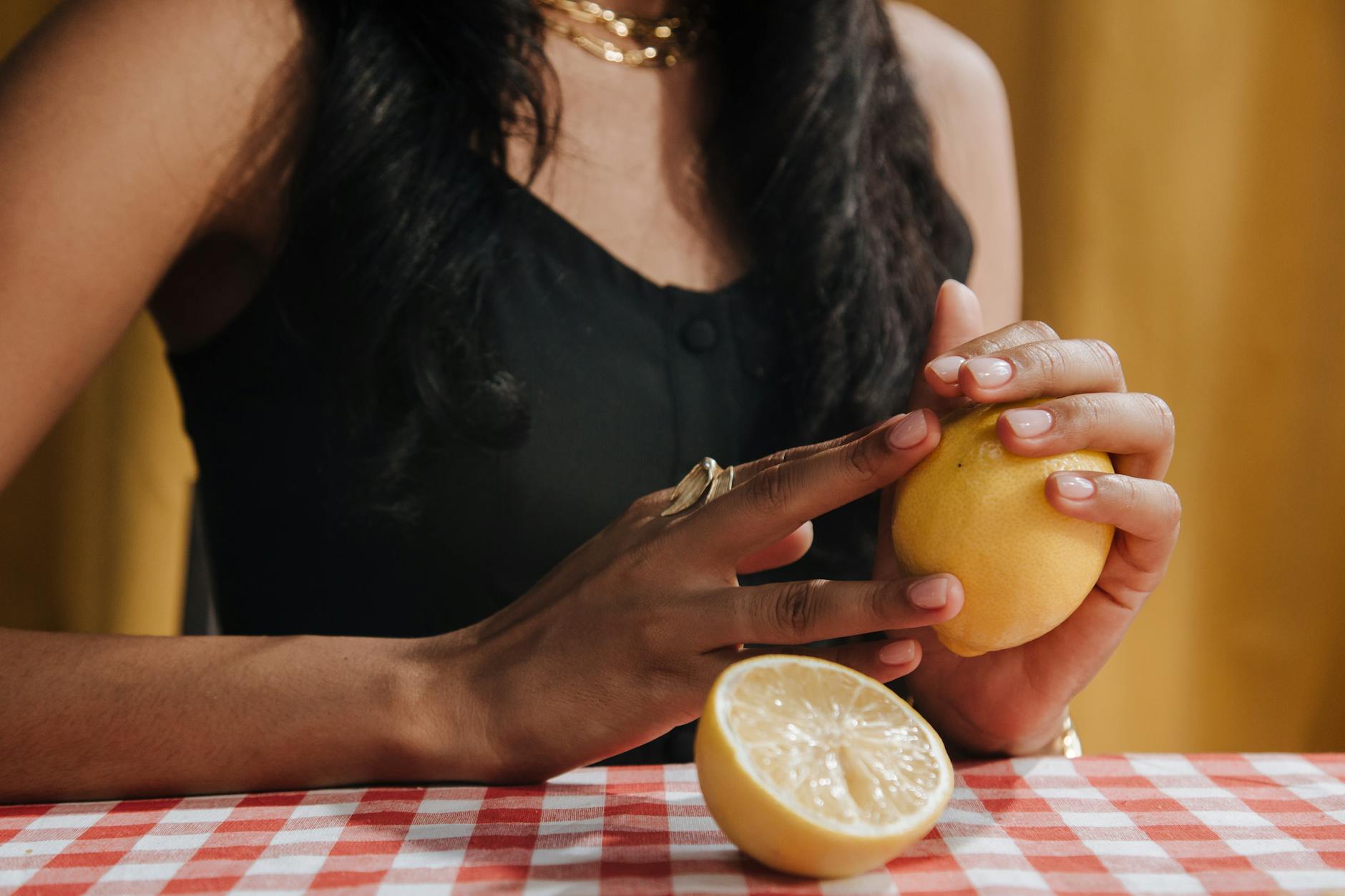 Close-up of hands holding a sleek vibrator, representing intimate connection and new relationship pleasure