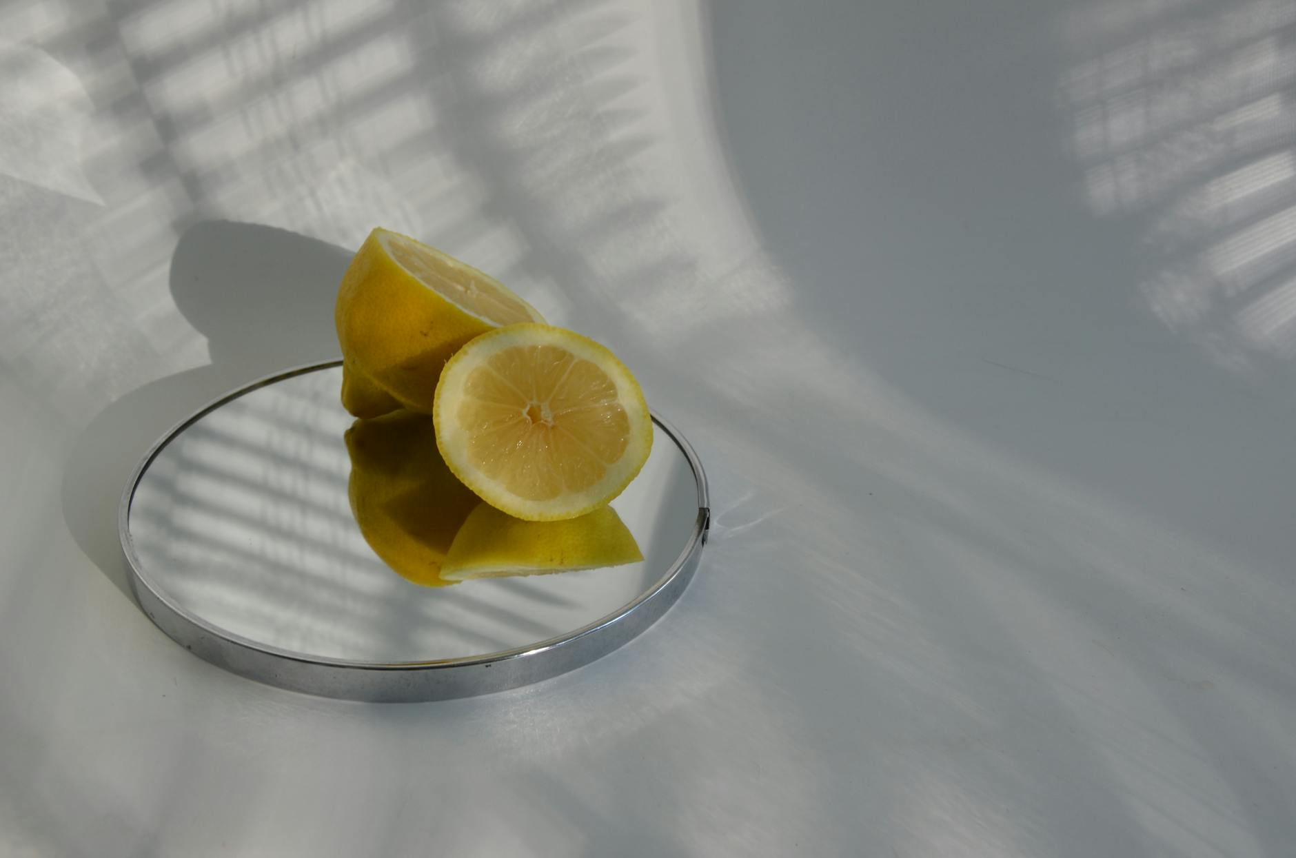 Hands holding a blue personal massager, showing how to grip a lemon vibrator properly